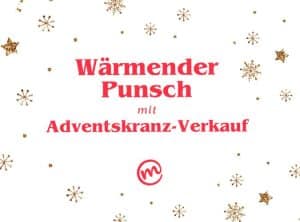 Ein Banner mit dem Schriftzug "wärmender Punsch mit Adventskranz-Verkauf". Rundherum sieht man Schneeflocken aus Gold-