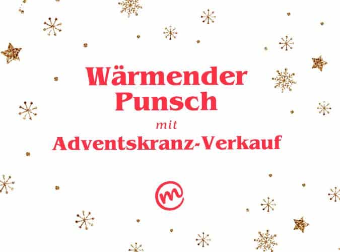 Ein Banner mit dem Schriftzug "wärmender Punsch mit Adventskranz-Verkauf". Rundherum sieht man Schneeflocken aus Gold-